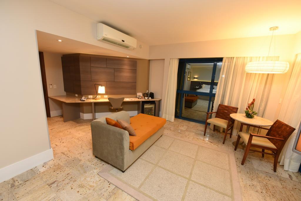 Hotel Atlante Plaza Recife Exterior foto A living room in a suite at the Hard Rock Hotel